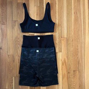 2 Pairs of VUORI bike shorts and one sports bra size M black and camo